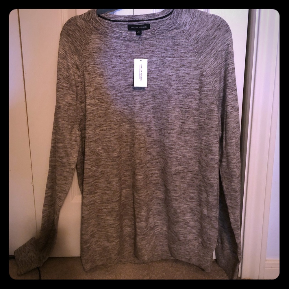 Never worn, new gray pull over sweater top